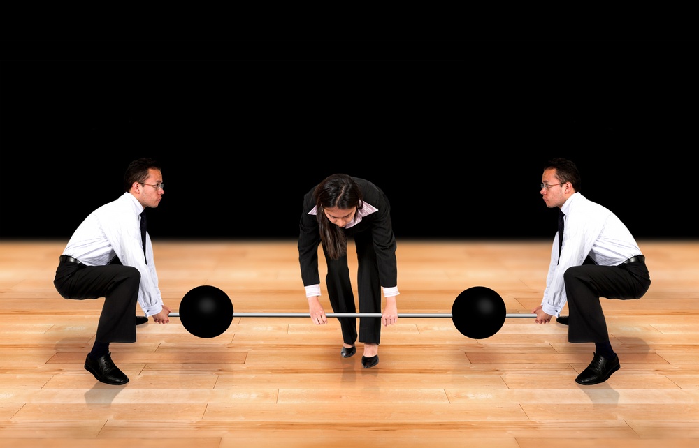 teamwork business power - two guys helping a female business woman lifting weights.jpeg